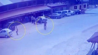 Kontrolden çıkan otomobilin altında kalmaktan son anda kurtuldular
