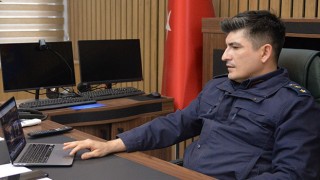 Türkoğlu’nda protokol üyeleri AA’nın ”Yılın Kareleri”ni oyladı