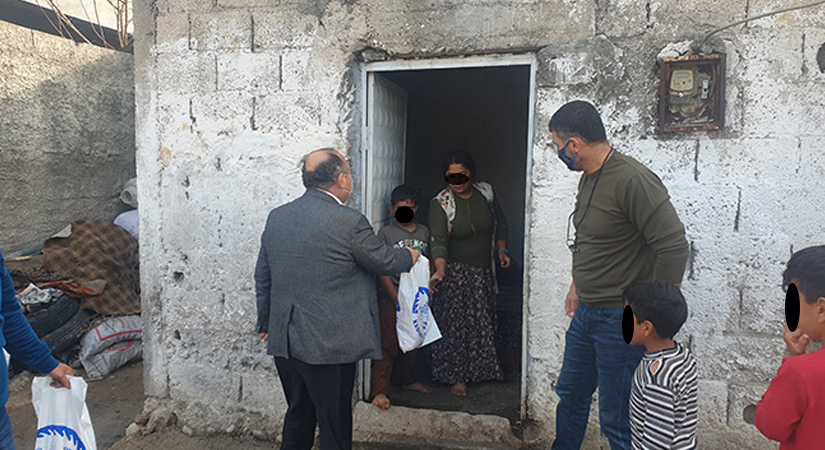 Tarhan, Muhtaç Ailelere Tavuk Eti Dağıttı